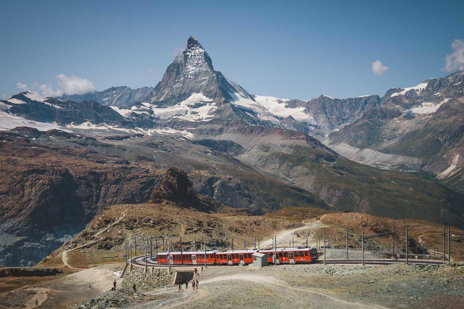 Gornergrat cogwheel train passing below the Matterhorn in Zermatt, Switzerland