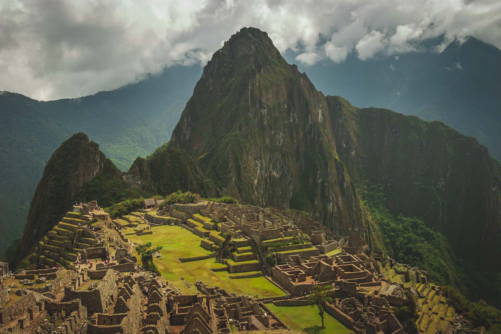 View of Machu Picchu ruins surrounded by Andean peaks