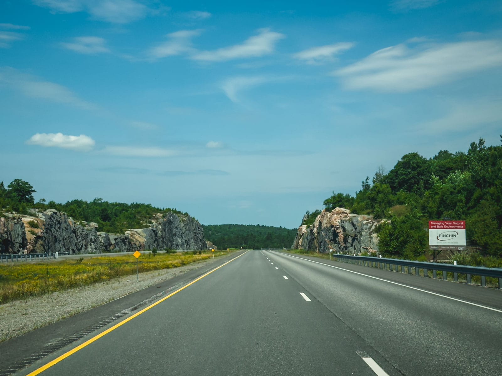Compact rental car parked near hiking trails in Greater Sudbury