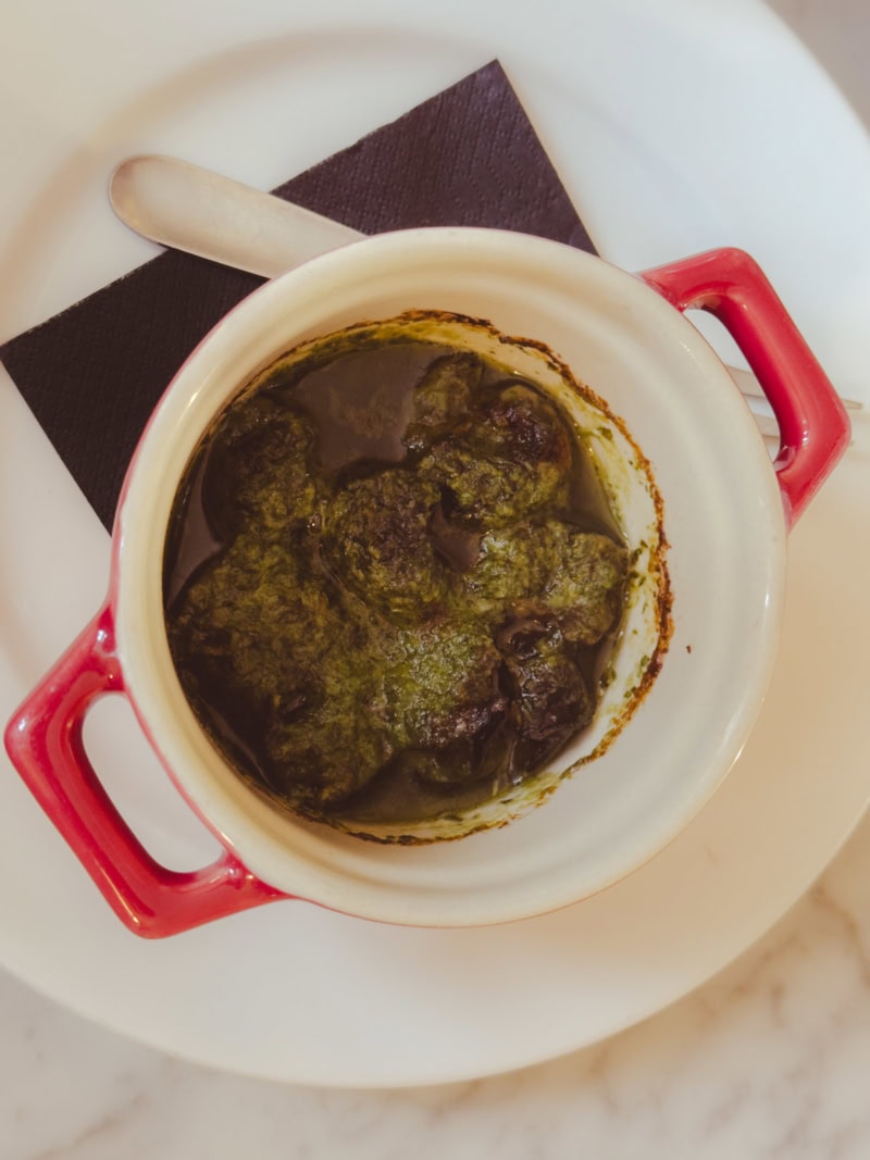 The bowl of escargots sizzling in garlic and parsley butter that we tried for the first time in Paris.