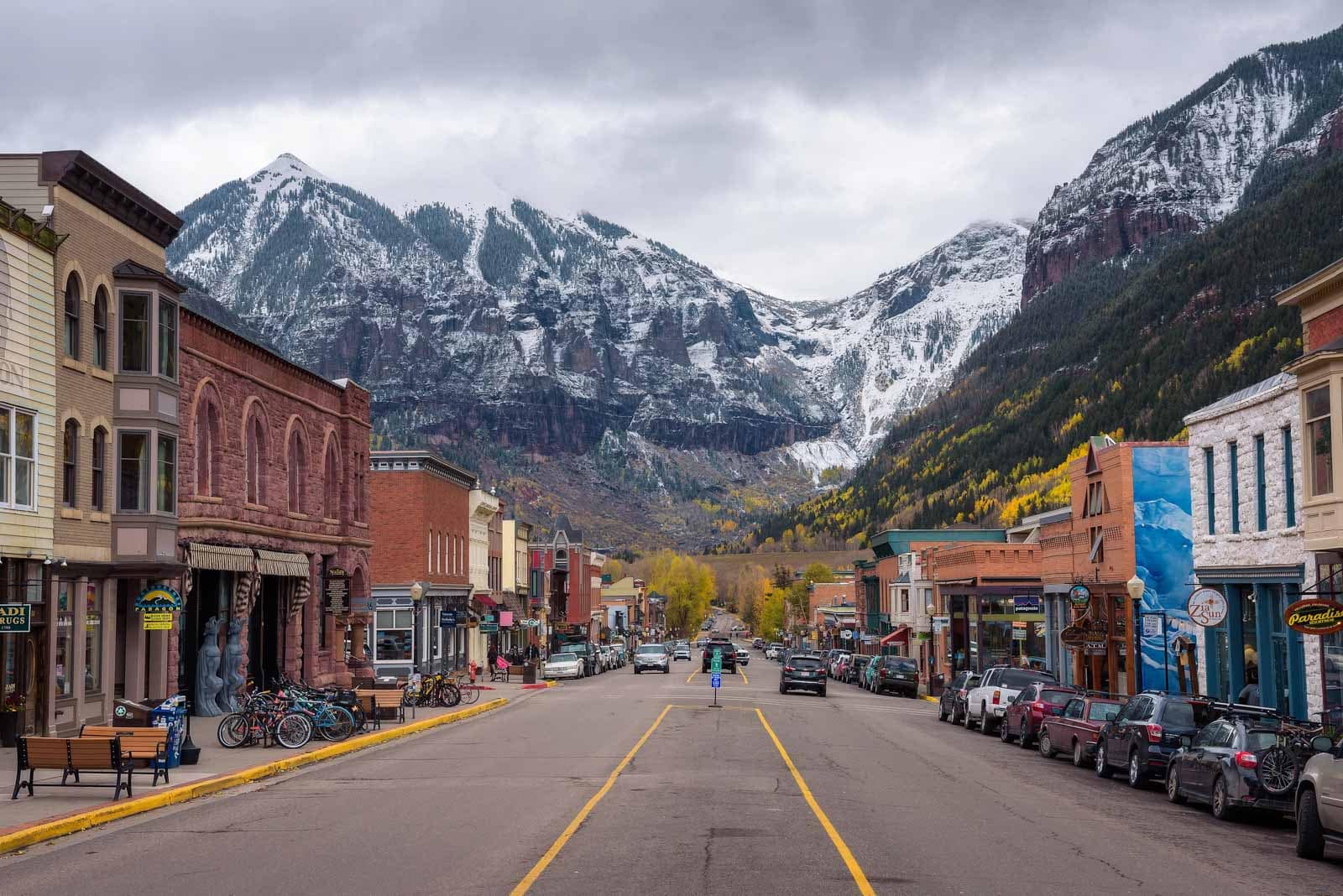 Downtown Telluride, Colorado with a light dusting of snow on the mountains.